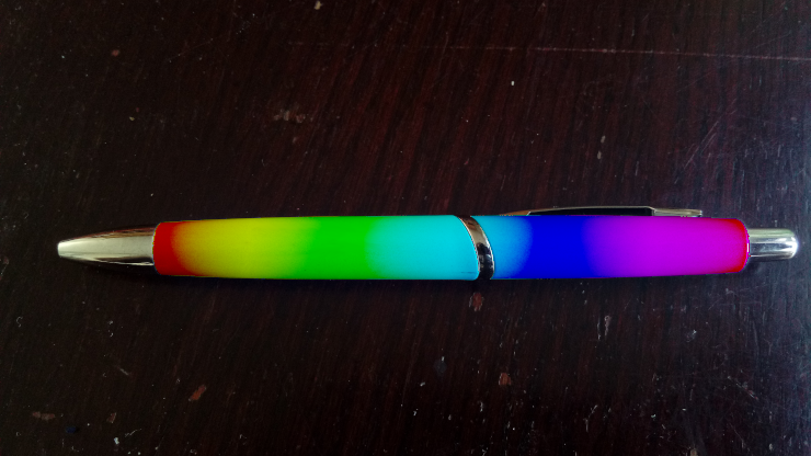 A retractable ballpoint pen in rainbow colors