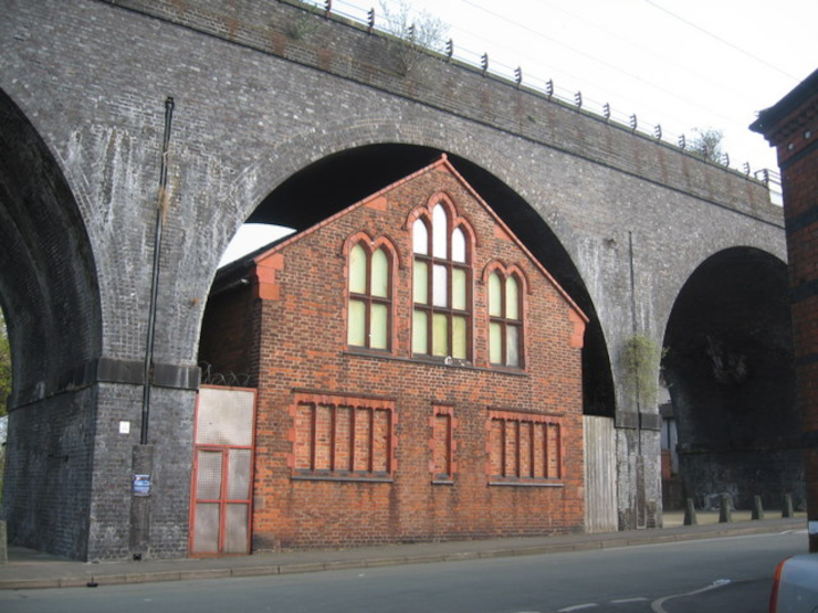 Runcorn Spiritualist Church in the UK, built awkwardly under an arch of the Queen Ethelfleda Viaduct