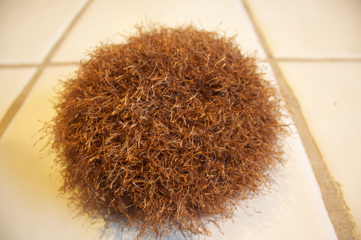A tribble-substitute on a tile floor