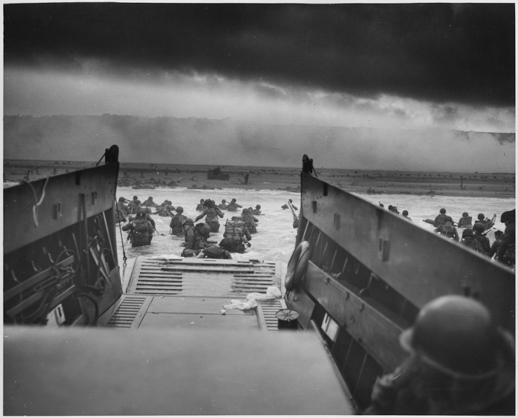 Photograph of US troops storming the beach