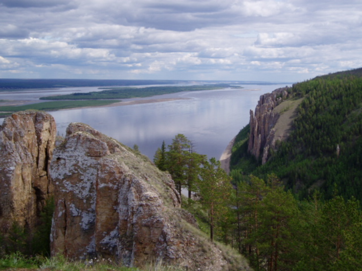 A view of the Lone Maiden rock formation (far right) above the Lena River, Yakutsk