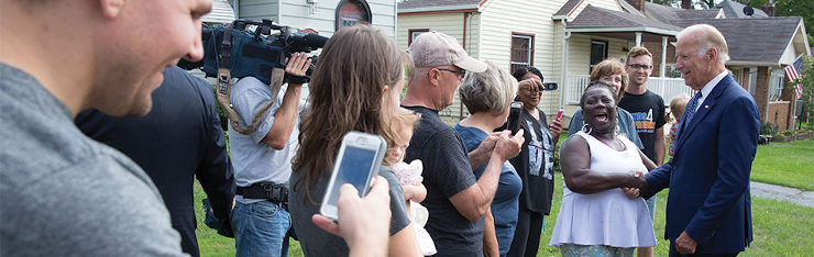Joe Biden touring a neighborhood in Youngston, Ohio