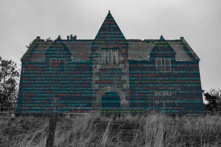 An old, run-down house with a "haunted" look to it, with JavaScript code pushing through the structure
