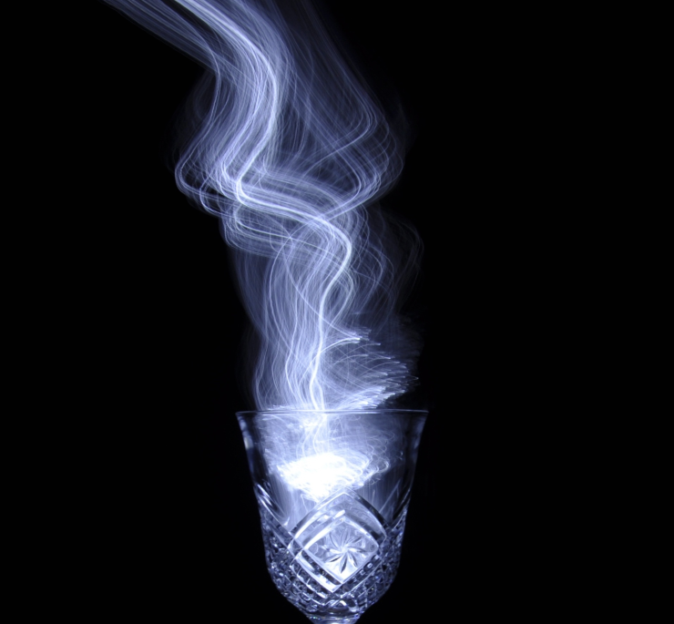 CGI smoke rising from a crystal glass