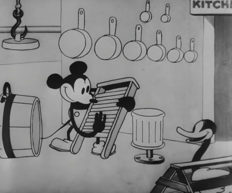 A still from Steamboat Willie, featuring Mickey Mouse playing music on household items